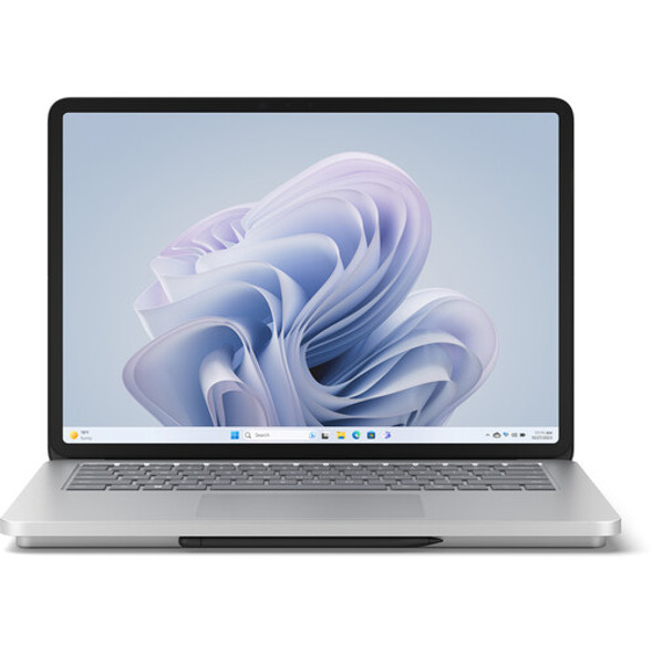 Microsoft Surface Laptop Studio 2 in platinum finish, shown open with 14.4-inch PixelSense touchscreen, featuring Intel Core i7, 32GB RAM, 1TB SSD, and NVIDIA RTX 2000 Ada graphics