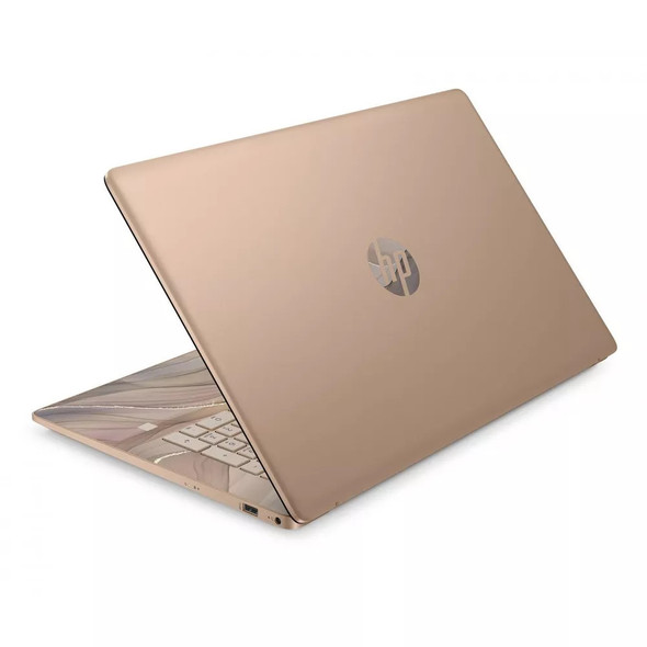 Chai Latte matte finish texture and rear venting on the HP 15-fc0509ds laptop.