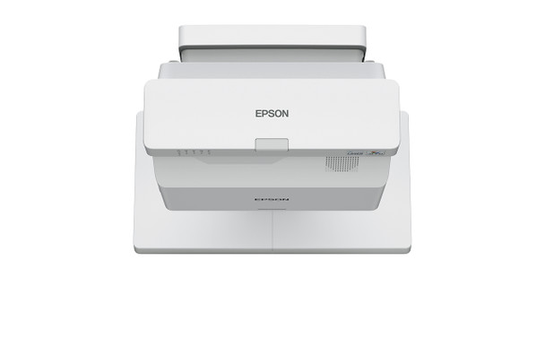 Front view of the Epson PowerLite 770F Lamp-Free Laser Projector V11HA79020 in white, featuring a compact design with lens positioned on the left, ventilation grilles on the sides, and control buttons on the top.