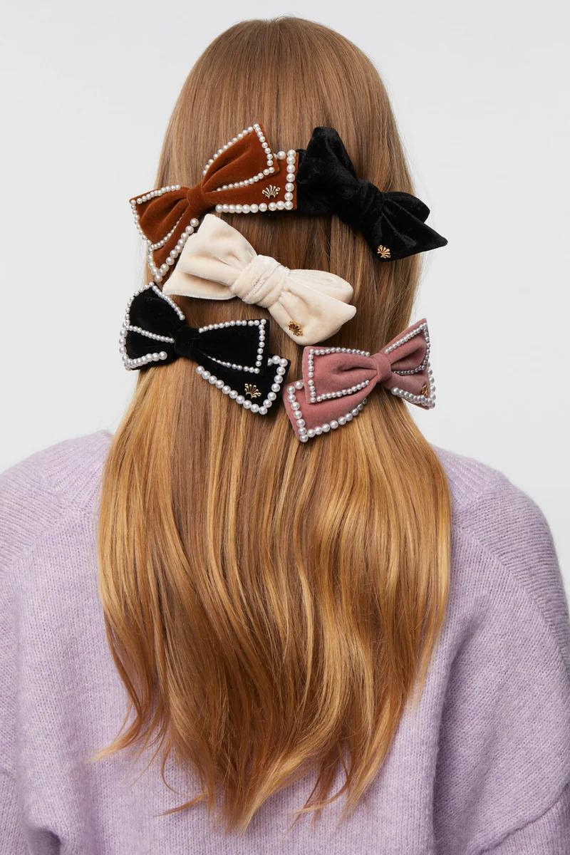 Lele Sadoughi Velvet Ribbon Bow Tie Barrette in hair with other bows