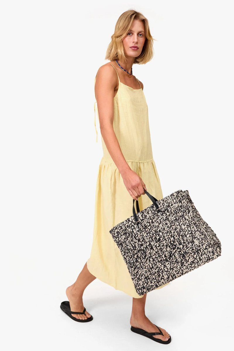 Clare V Summer Simple Tote Black/Cream Raffia full body, held at side