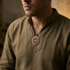 Detailed Copper Wheel of the Year Jewelry featuring seasonal symbols on a black cord