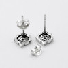 Back view of heart pentagram earrings showing the .925 silver hallmark, posts, and secure butterfly backings