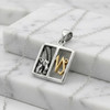 Sterling silver Capricorn: Horoscope pendant featuring a silver goat and gold zodiac symbol on white marble