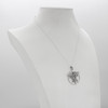 Asclepius necklace and pentacle pendant serving as a healers pentagram, this beautiful sterling silver amulet is displayed elegantly on a white jewelry bust