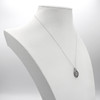 Pentacle amulet and Druid Pendant displayed gracefully on a white jewelry bust, a stunning Celtic druid necklace in highly polished sterling silver