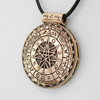 Magic Circle Necklace close-up angled to the left, emphasizing the polished gold-tone finish, planetary symbols, and the central heptagram star design