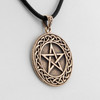 Druid pentagram close-up angled to the left, showing the beautiful intertwining details of the Celtic knot border framing the central star