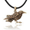 Raven pendant at our pagan jewelry store in a polished gold-tone bronze, featuring a highly detailed, 3D sculpted crow design