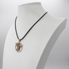 Wiccan jewelry piece displaying a bronze Caduceus Pentacle necklace elegantly draped on a white jewelry bust to show scale