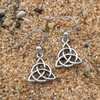 Silver hook earrings featuring an openwork three-pointed Celtic trinity knot design