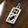 Pisces charm necklace featuring a rectangular sterling silver pendant with a gold vermeil zodiac symbol and two silver fish