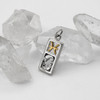 Handcrafted Pisces jewelry piece featuring the water sign's signature symbol in gold vermeil over high-quality sterling silver