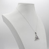 .925 sterling silver Triquetra Necklace showcased on a white jewelry display bust, at our pagan jewelry store