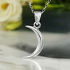 Beautiful Tiny Moon Goddess witchy gift Necklace, crafted from sterling silver. A versatile piece that functions as exquisite Witch jewelry, a meaningful Wiccan or Pagan accessory, or a powerful Occult symbol. A Mystical Amulet, offering an Esoteric touch to your everyday style or your sacred Altar Jewelry.