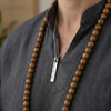 Rectangular Triquetra Pendant Showcasing Polished Silver Celtic Details