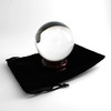 3-inch crystal ball on a wooden stand with a black velvet carrying pouch