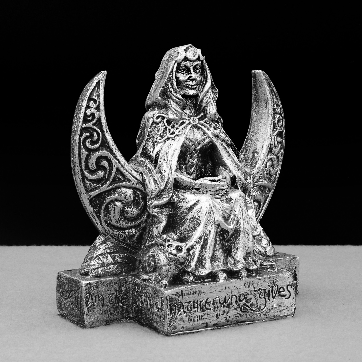 Left angled view of the Dryad Design Wiccan goddess statue, showing the seated lunar deity with a small cat at her feet against a decorative crescent moon