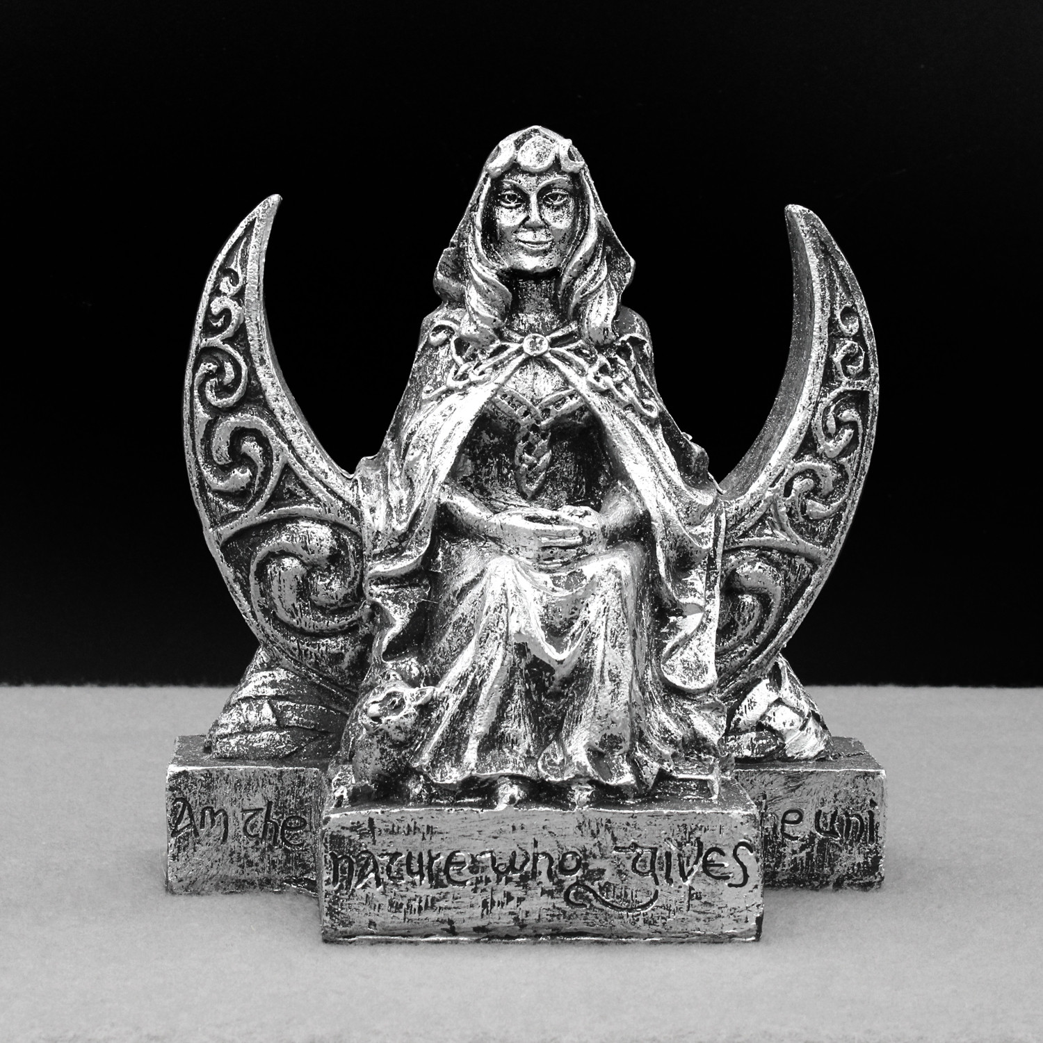 Front view of the Wiccan lunar goddess figurine designed by Paul Borda, featuring a silver-finished witch goddess seated on an engraved base