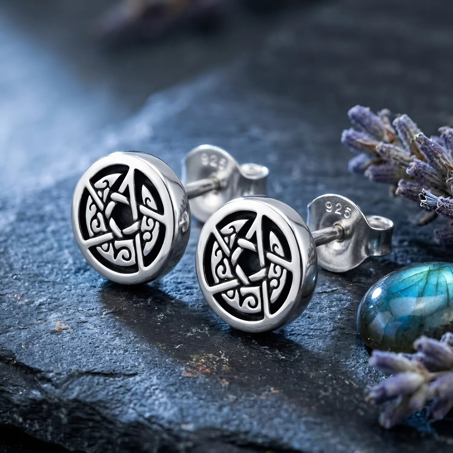 Pentagram Studs: 925 sterling silver post earrings displayed on dark stone for a mystical aesthetic