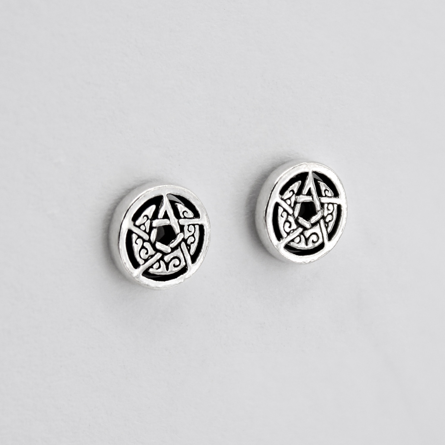 Pentagram Studs: Detailed silver post earrings showcasing a classic Wiccan moon and star symbol