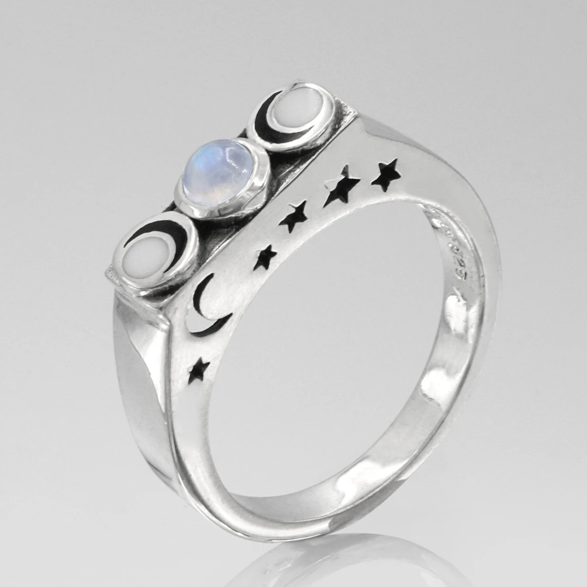 Sterling Silver Wiccan Witch Ring, adorned with a mesmerizing Moonstone, embodies the Triple Goddess and makes a powerful addition to any Witchcraft jewelry collection for Pagan practices.