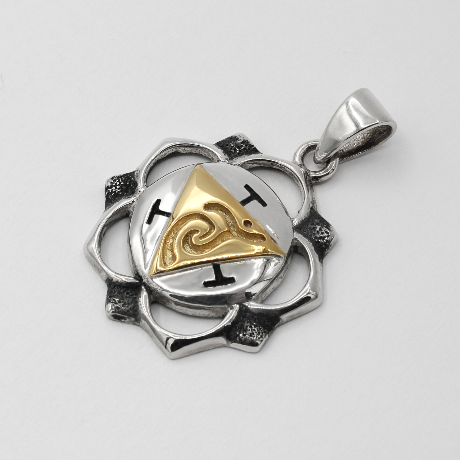 Chakra pendant for the Solar Plexus shown on a silver chain with detailed silver craftsmanship and gold accents