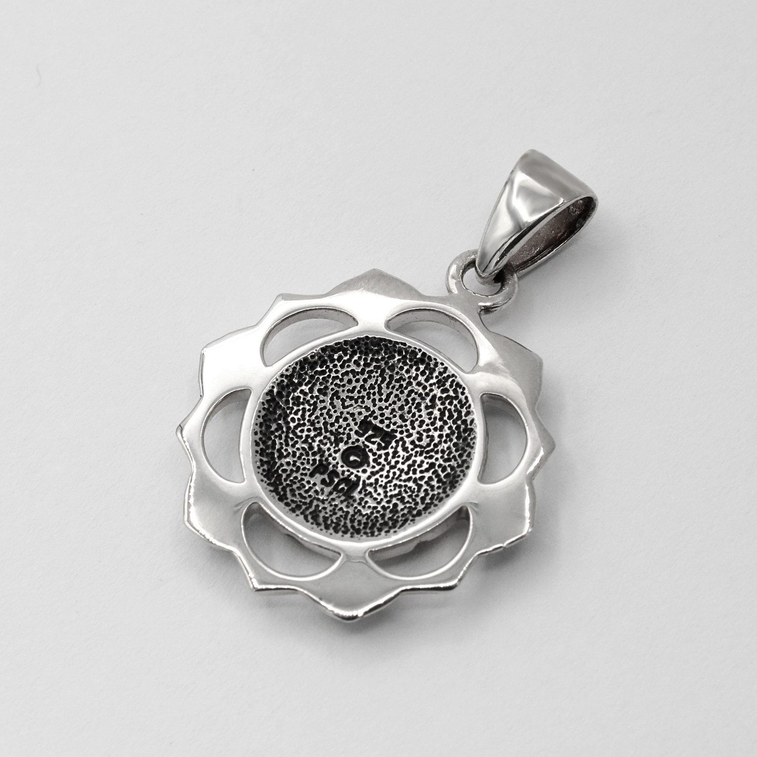 Back of Anahata necklace close-up revealing the fine craftsmanship of the sterling silver heart  chakra pendant