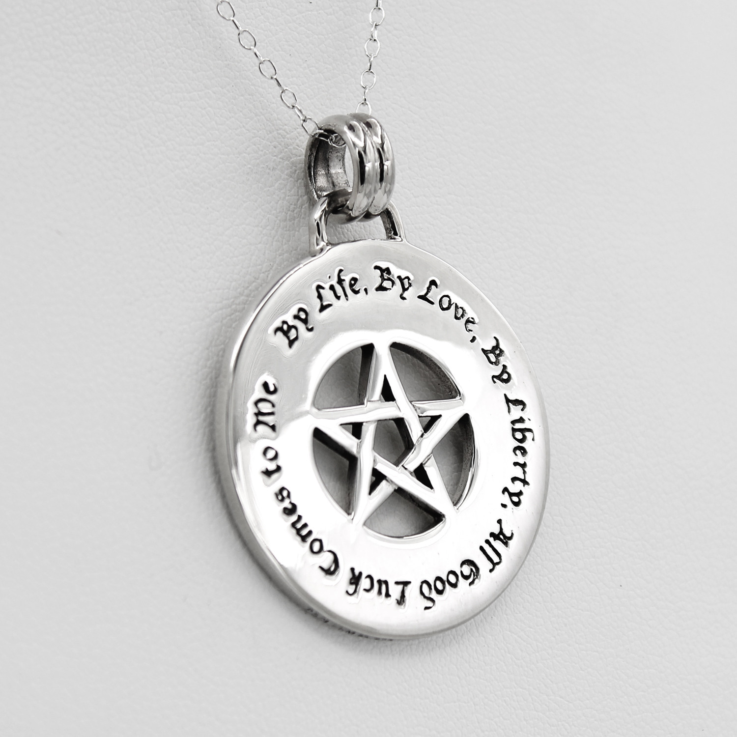 Pentacle pendant good luck talisman, a beautifully crafted Wiccan amulet in shiny .925 sterling silver shown on a white background