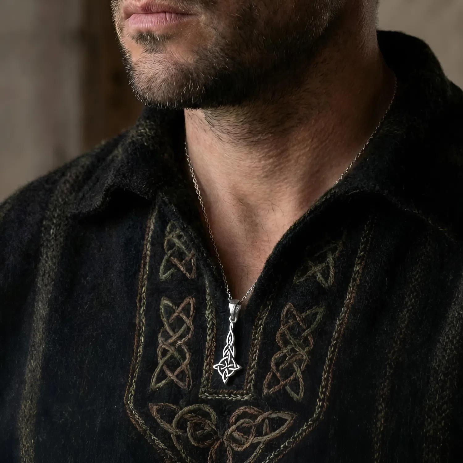 Elongated witches knot pendant silver witchcraft necklace