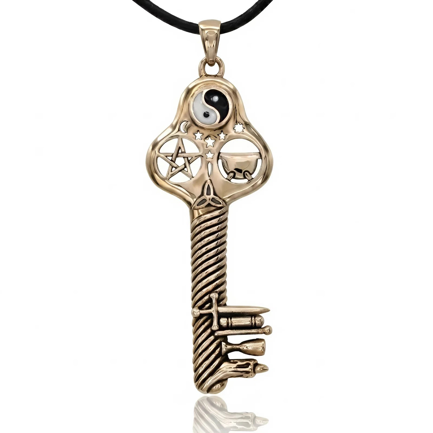 Witches key necklace, a large gold-bronze witchcraft key hanging straight against a bright white background, showing its intricate Wicca symbols