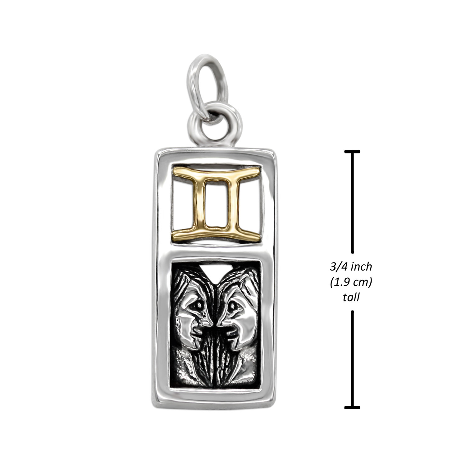 Detailed view of the silver twin faces and gold-toned Gemini symbol set within a polished rectangular silver frame