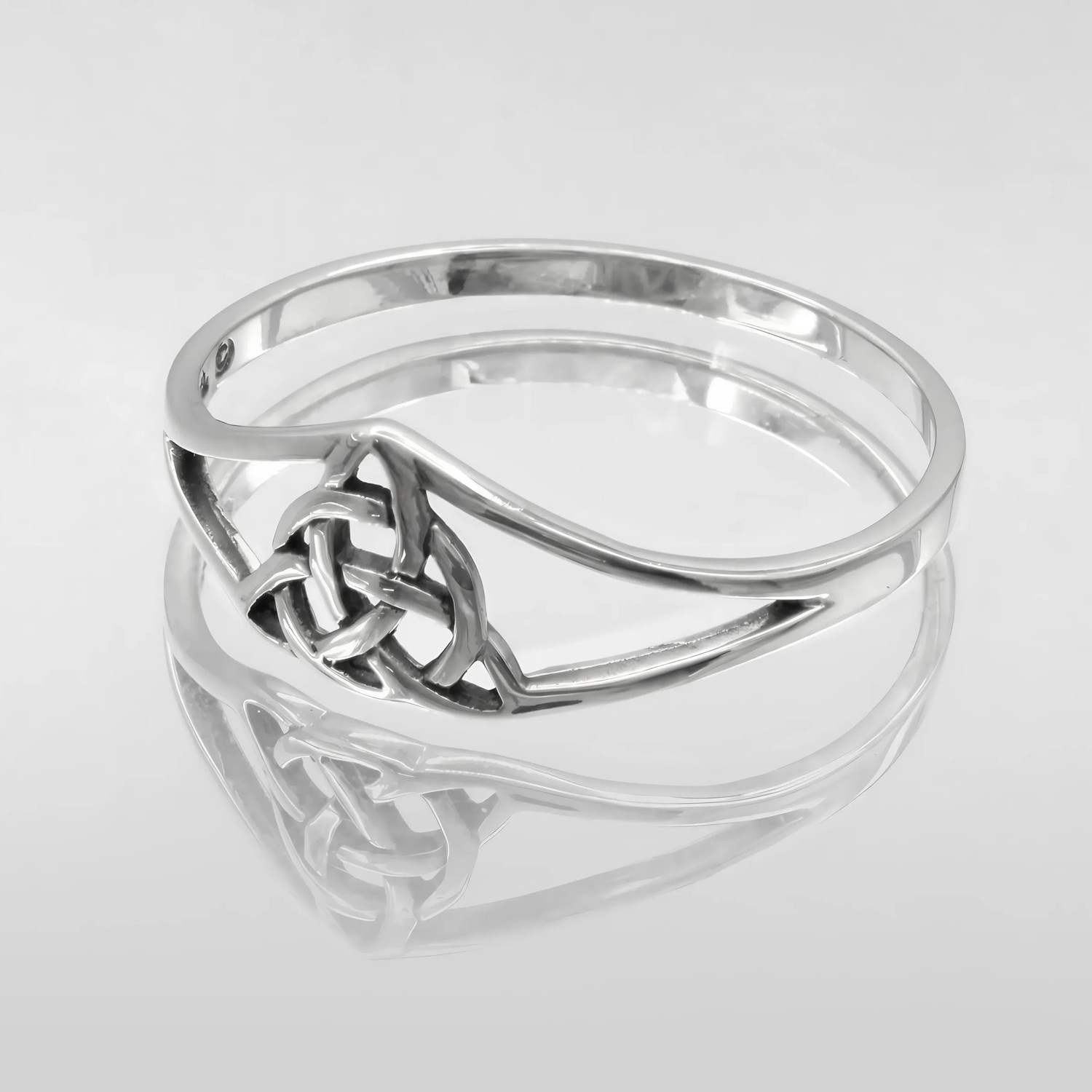 925 Sterling Silver Celtic Trinity Knot ring on a light background