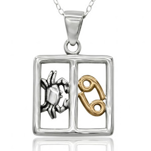 Zodiac horoscope Cancer pendant in premium .925 sterling silver with a gold astrological glyph, captured close-up against a crisp, white background