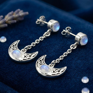 Moonstone moon earrings featuring a mystical rainbow moonstone cabochon and a dangling Celtic crescent moon Pagan jewelry
