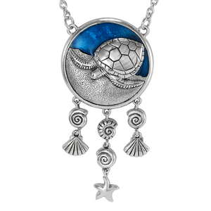 This large Sea Witch necklace features a turtle familiar animal against a vibrant blue enamel background, accented by dangling shells and five pointed star This large Sea Witch necklace features a turtle familiar animal against a vibrant blue enamel background, accented by dangling shells and five pointed star