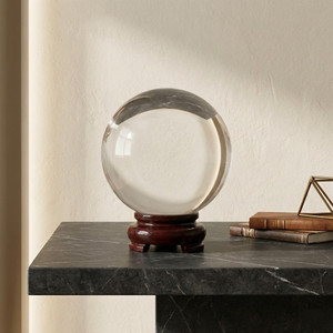 5-inch crystal ball on a wooden stand.
