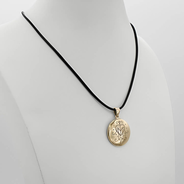 Bronze Ezili Freda Voodoo Veve Penadnt Necklace on Torso Bronze Ezili Freda Voodoo Veve Penadnt Necklace on Torso