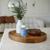 Lifestyle image showing ingredients of Homedics® SereneScent™ Frosted Cypress fragrance.