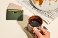 Image of Tile Slim- Slate in green wallet