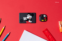 Image of a Tile Starter Pack - Mickey Mouse on a red desk