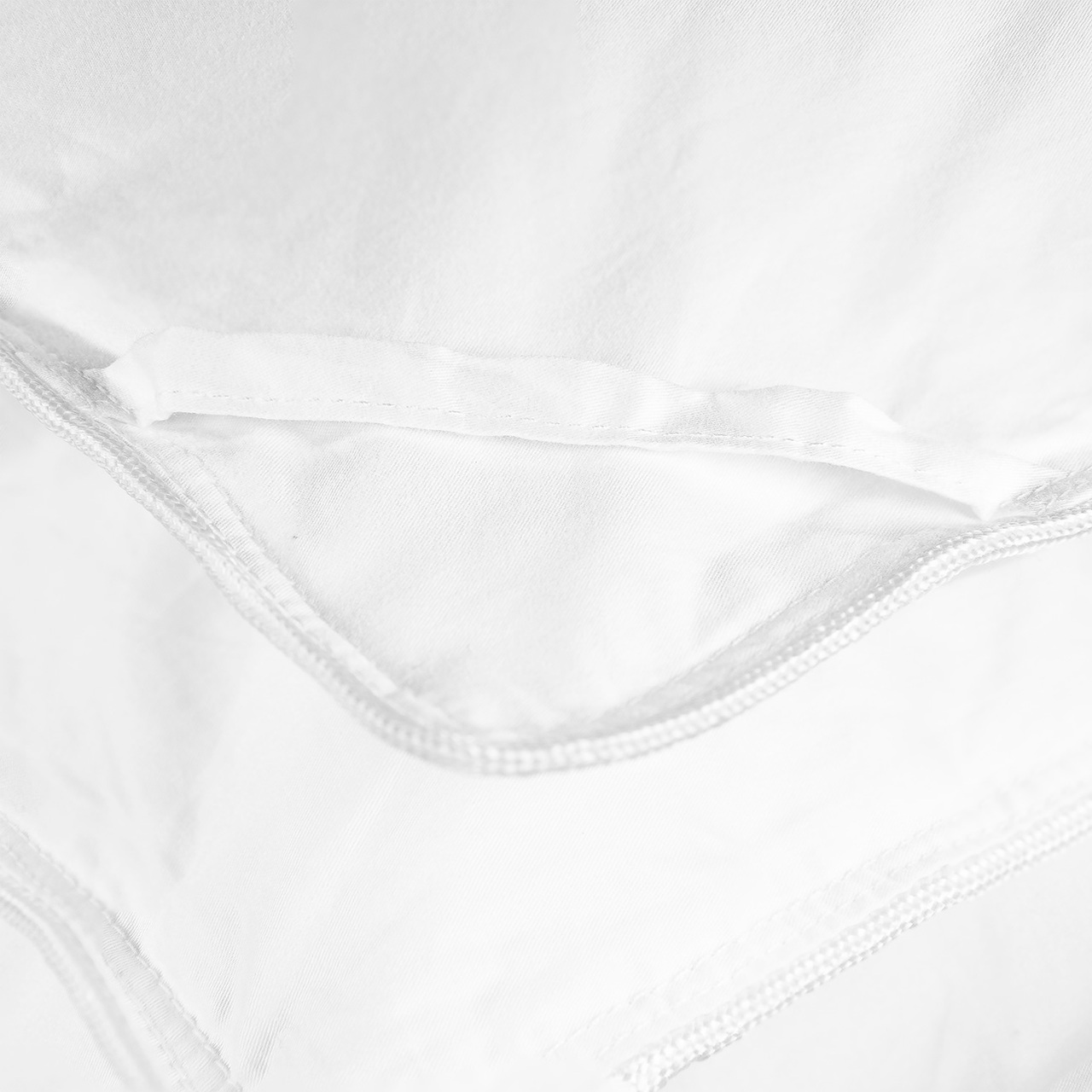 Down comforters are equipped with corner loops for attachment to duvet cover that will prevent down comforter from slipping inside the duvet cover. 