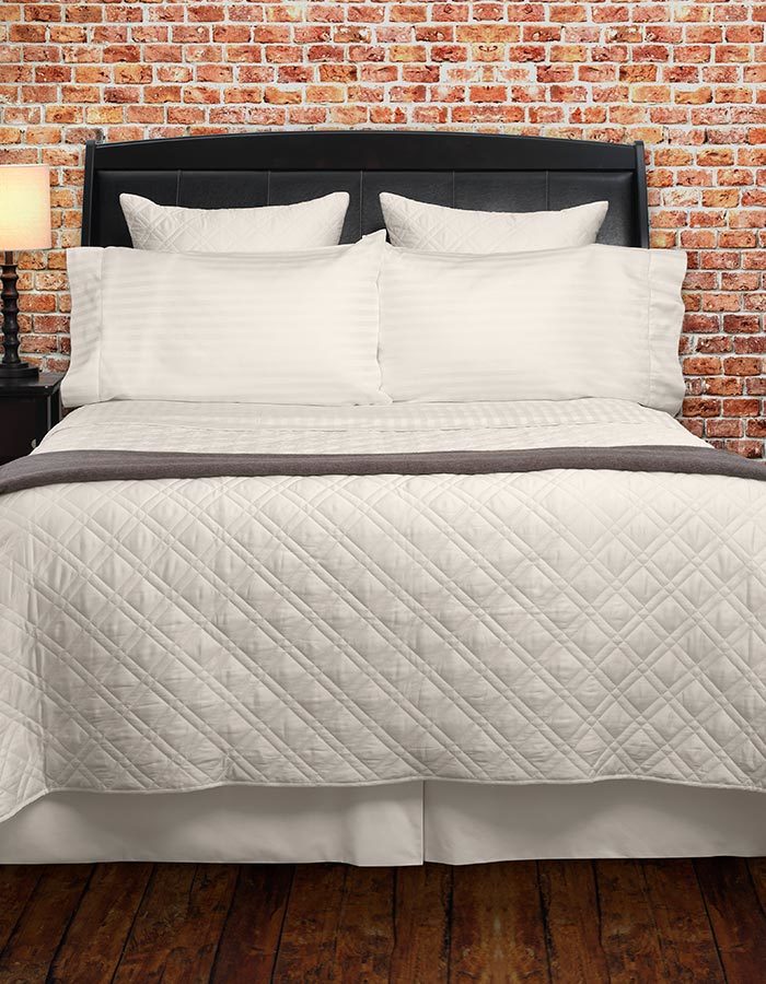 Luxury Quilted Coverlets, available in white, ivory & sable.