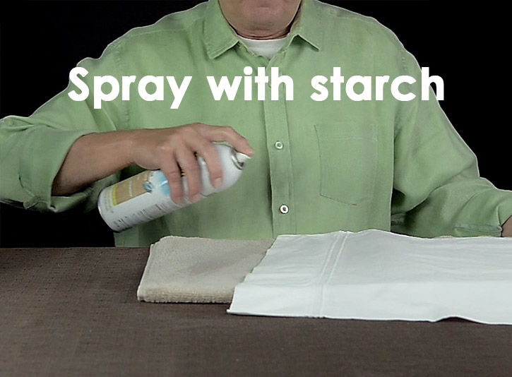 After you have ironed the sheet dry, spray it with starch and iron it again.