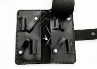 a black 4 piece scissor case opend showing all 4 slots