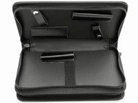 a black 4 piece scissor case opend showing 4 slots
