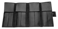 A black leather scissor case opened showing 8 pieces capacity