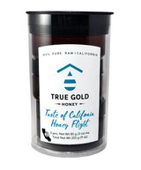 True Gold Honey - Taste of California Honey Flight. A sleek, elegant trio of petite honey jars, each showcasing a distinct floral source—from amber to golden hues. Housed in a tastefully labeled sleeve or box, the set evokes the rustic charm and natural beauty of California, making it ideal for gift-giving, entertaining, or indulgent everyday use.