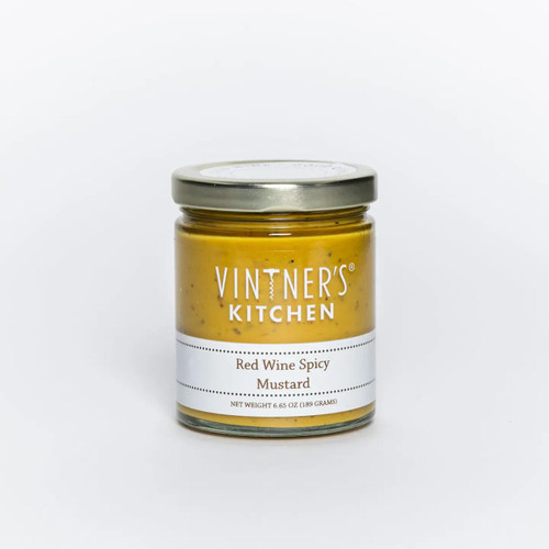 Vinter's KitchenRed Wine Spicy Mustard - A sleek 6.65 oz glass jar filled with vibrant golden mustard, speckled with herbs and spices. The clean, modern label from Vintner’s Kitchen emphasizes artisan quality, while the rich color hints at the wine, peppers, and tomatoes inside. Ideal for gifting or gourmet condiment collections. Vinter's KitchenRed Wine Spicy Mustard - A sleek 6.65 oz glass jar filled with vibrant golden mustard, speckled with herbs and spices. The clean, modern label from Vintner’s Kitchen emphasizes artisan quality, while the rich color hints at the wine, peppers, and tomatoes inside. Ideal for gifting or gourmet condiment collections.