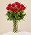 One Dozen Fine Long Stem Roses is a classic expression of love and sweet affection!  Our finest red roses arrive accented with lush greens and baby's breath, beautifully arranged in a clear glass vase, to make this a day they won't soon forget.